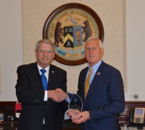 Grand Master receives an award from the Red Cross on behalf of all Massachusetts Freemasons